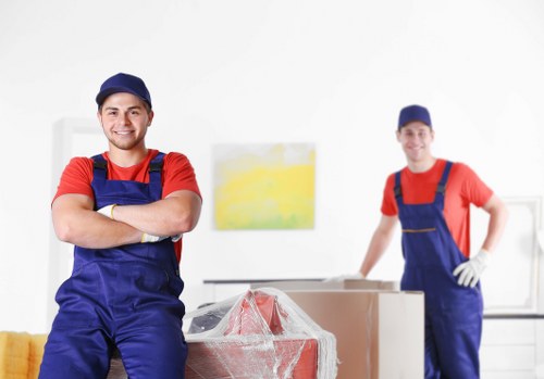 Man and van removals service loading furniture in Barnet
