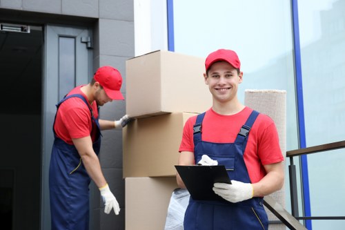 Moving team handling home removals in Barnet on a local street