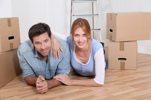 House movers preparing furniture for transport in Barnet