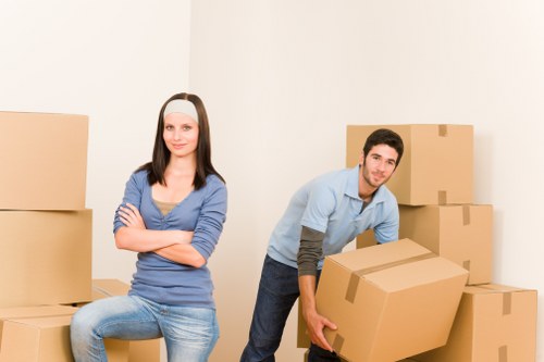 Professional movers handling furniture during a Barnet house removal