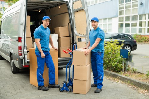 Removal team planning a home move in Barnet with boxes and wrapping materials